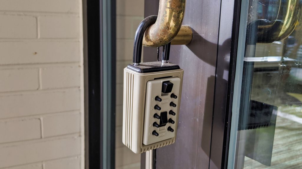 A key lock box on the door helps prevent house lockout