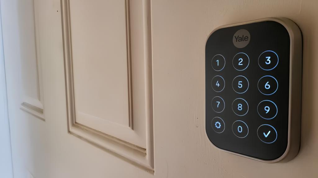 A close-up image shows a Yale smart keypad lock with illuminated numbers installed on a residential door in South Pasadena