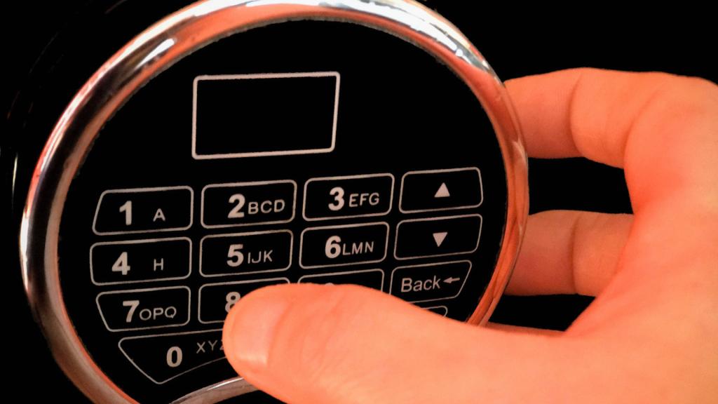 Safe repair cost for a digital safe keypad with a person entering a code
